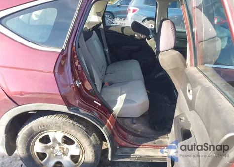 2015 Honda Cr-V Lx z USA, uszkodzony, nr VIN 2HKRM4H38FH627039